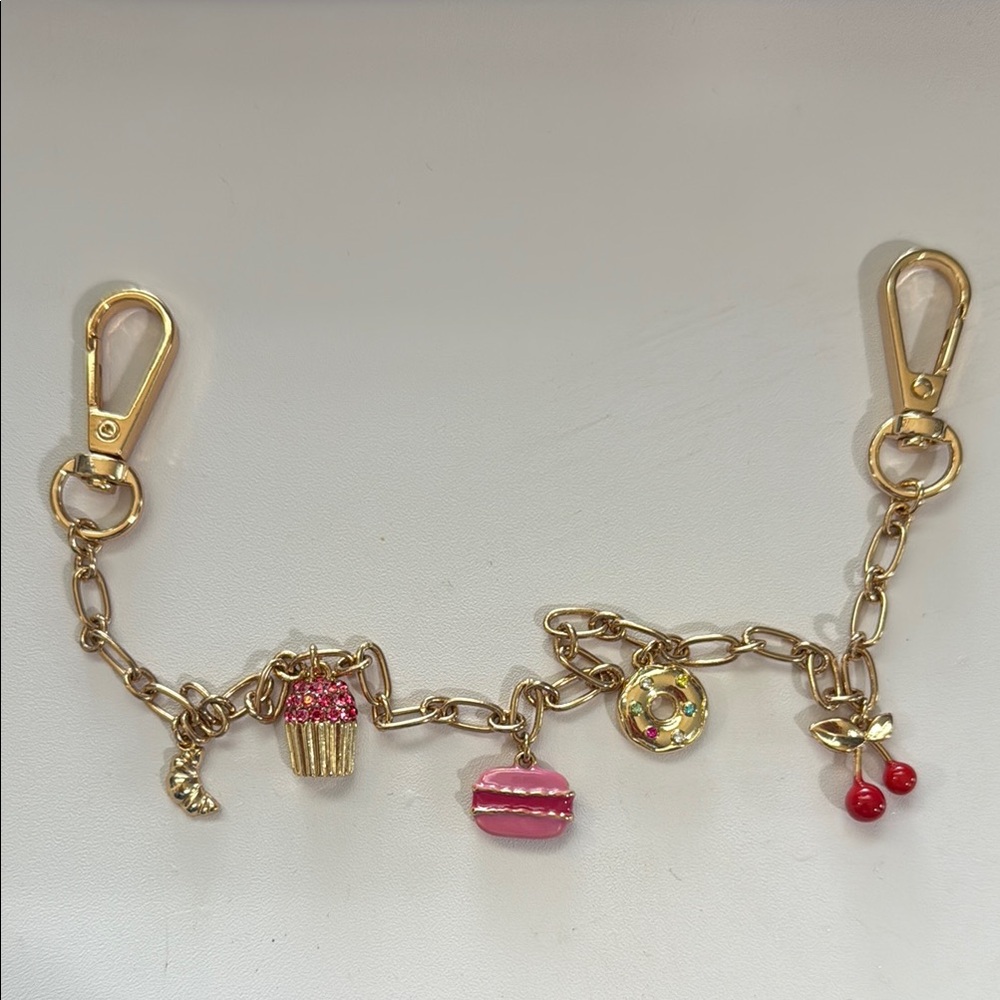 Gold Bag Charm Bracelet with Pink Accents